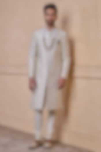Ivory Brocade & Polyester Blend Sherwani Set by TASVA at Pernia's Pop Up Shop