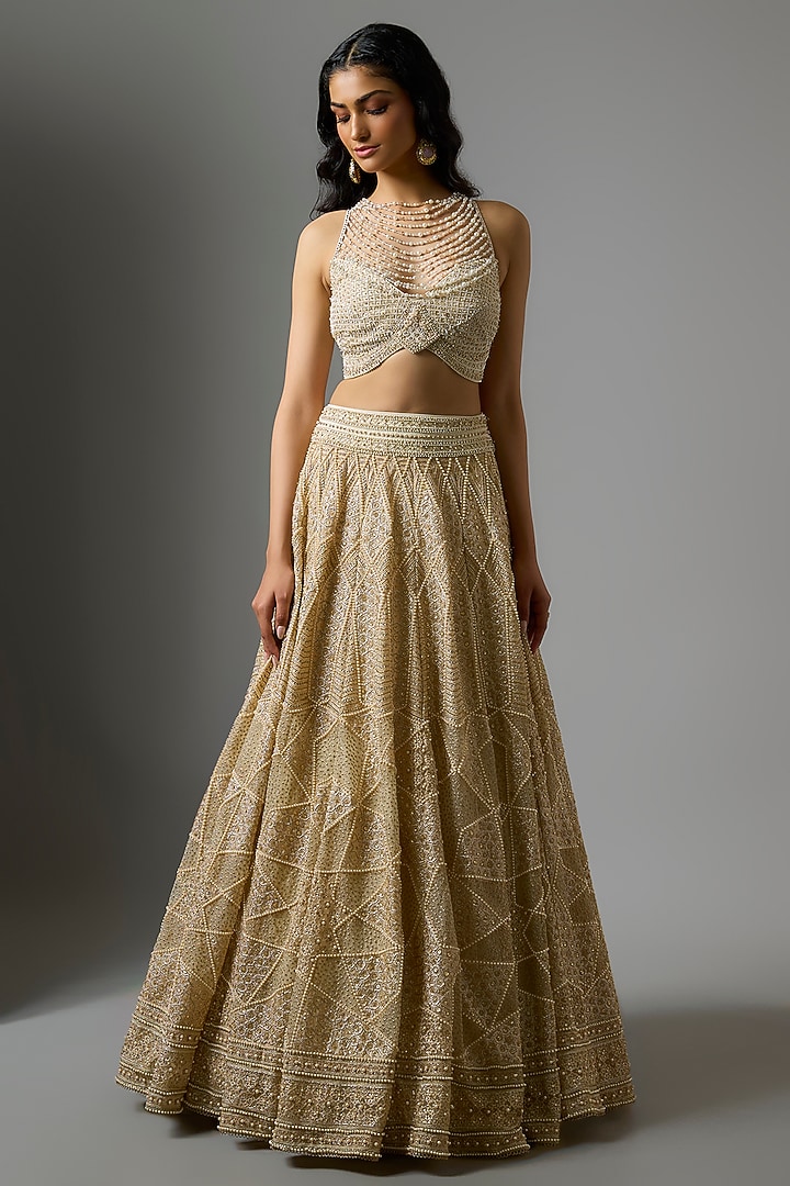 Ivory Tulle Sequins Embroidered Flared Bridal Lehenga Set by Tarun Tahiliani at Pernia's Pop Up Shop