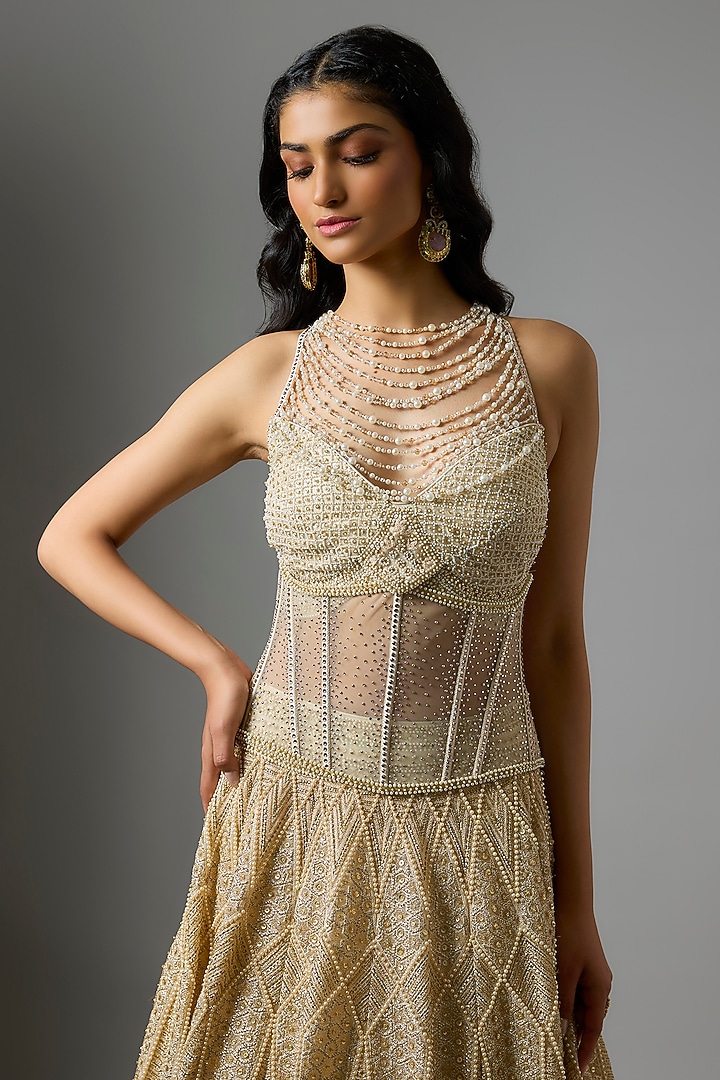 Ivory Tulle Sequins Embroidered Flared Bridal Lehenga Set by Tarun Tahiliani at Pernia's Pop Up Shop