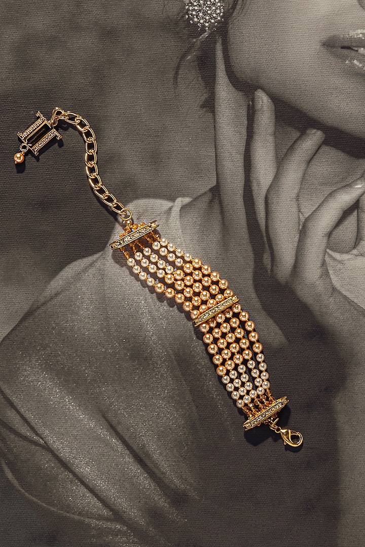 Gold Finish Pearl Bracelet In Sterling Silver by Tarun Tahiliani Accessories