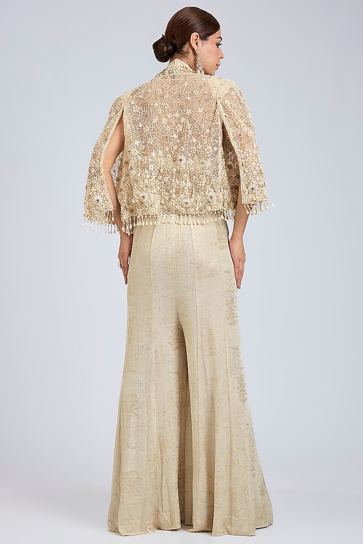 Ivory Foil Jersey Jumpsuit With Embroidered Cape by Tarun Tahiliani at Pernia's Pop Up Shop