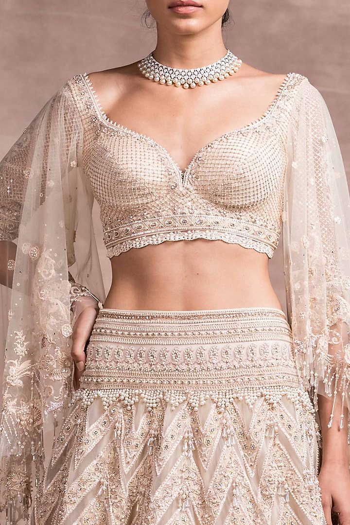 Ivory Embroidered Kalidar Bridal Lehenga Set by Tarun Tahiliani at Pernia's Pop Up Shop