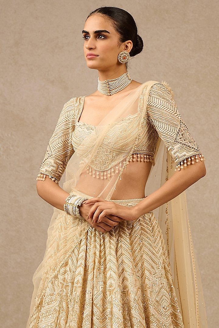 Ivory & Gold Tulle Embroidered Bridal Lehenga Set by Tarun Tahiliani at Pernia's Pop Up Shop
