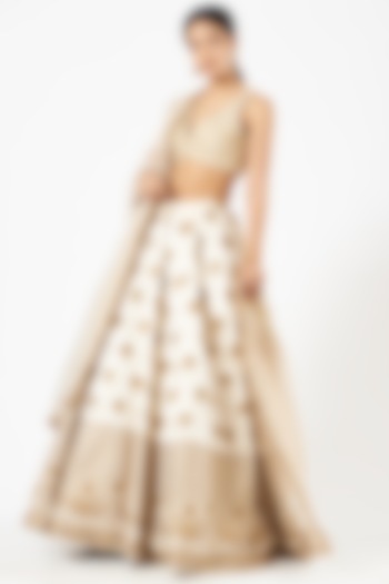 Ivory & Gold Embroidered Bridal Lehenga Set by Tara Thakur at Pernia's Pop Up Shop