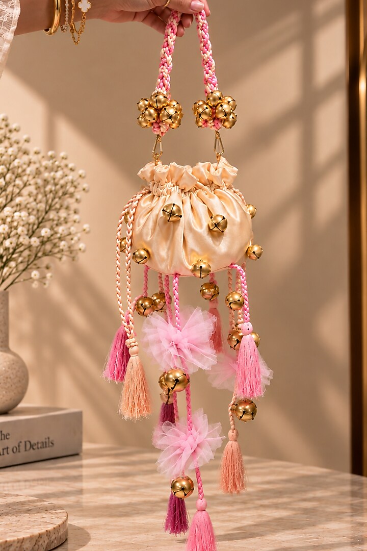 Ivory Satin Floral Embellished Handcrafted Potli by TAN Studio at Pernia's Pop Up Shop