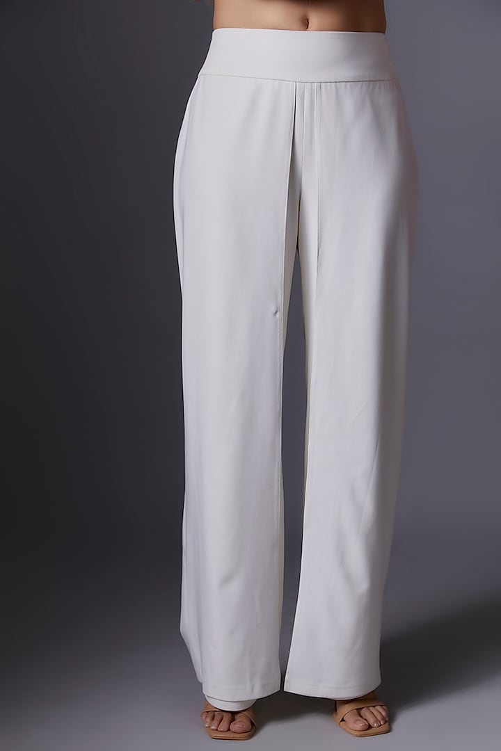 White Imported Crepe Straight Pants by Tanieya Khanuja