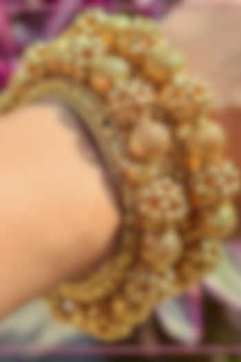 Gold Finish Ghungroo Bangles (Set of 2) by THE BLING GIRLL at Pernia's Pop Up Shop