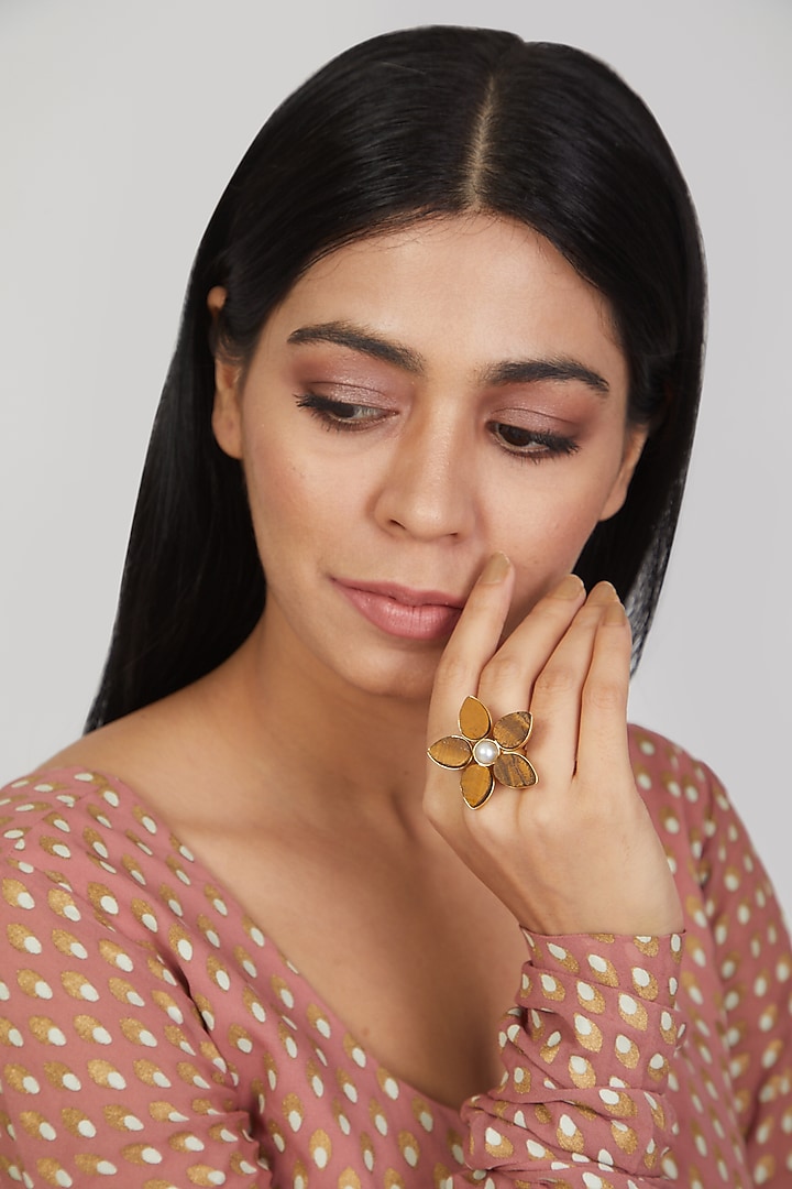 Gold Finish Floral Ring With Pearl by THE BLING GIRLL at Pernia's Pop Up Shop
