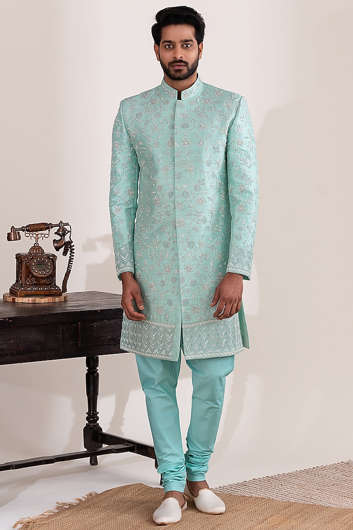 Aqua Blue Raw Silk & Satin Lycra Embellished Sherwani Set by TIRA BY NARESH RAJ