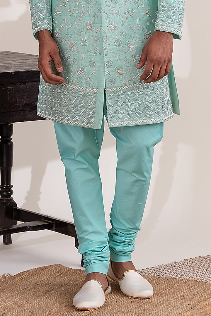 Aqua Blue Raw Silk & Satin Lycra Embellished Groom Sherwani Set by TIRA BY NARESH RAJ at Pernia's Pop Up Shop