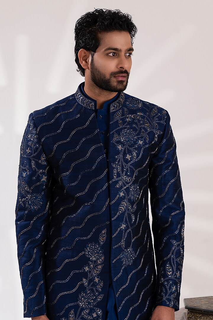Navy Blue Raw Silk & Chanderi Silk Floral Embroidered Groom Sherwani Set by TIRA BY NARESH RAJ at Pernia's Pop Up Shop