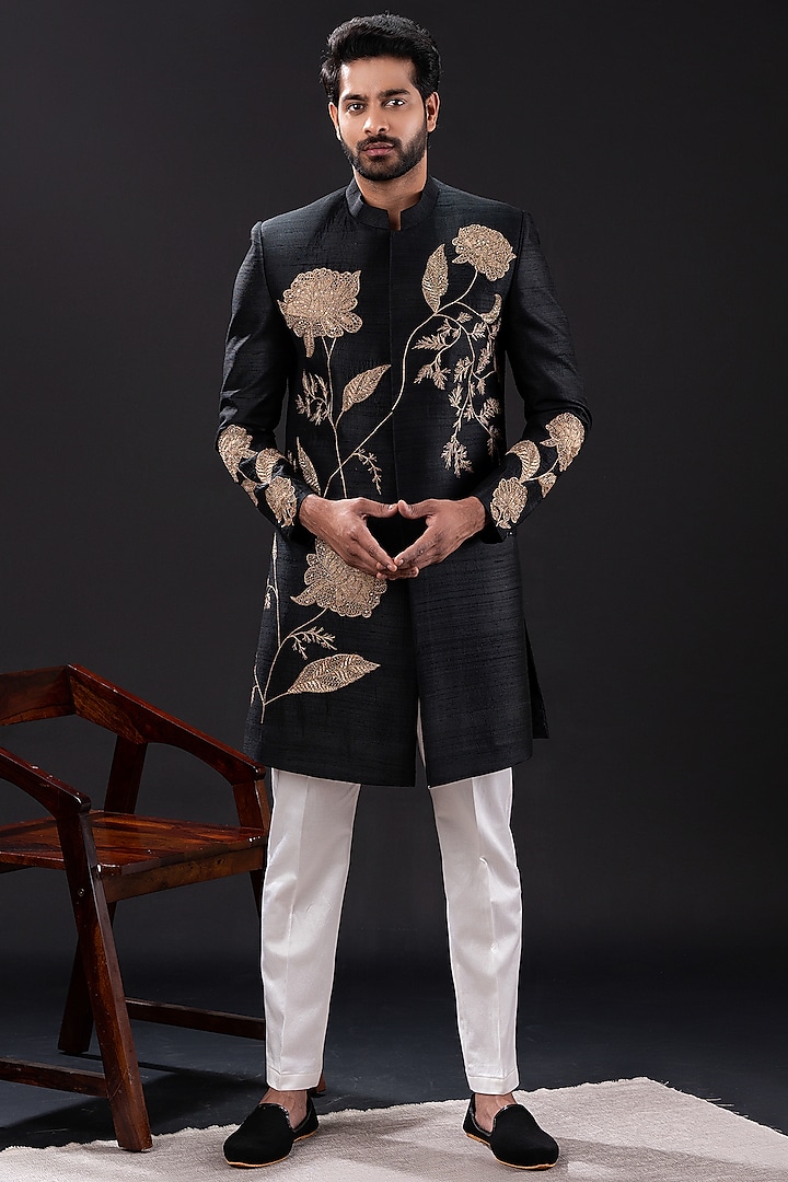 Black Raw Silk & Cotton Embellished Sherwani Set by TIRA BY NARESH RAJ