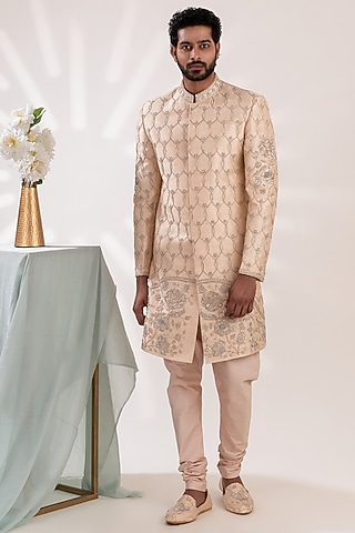 Light Gold Raw Silk Hand Embroidered Sherwani Set by TIRA BY NARESH RAJ