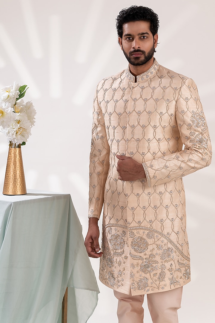 Light Gold Raw Silk Hand Embroidered Groom Sherwani Set by TIRA BY NARESH RAJ at Pernia's Pop Up Shop