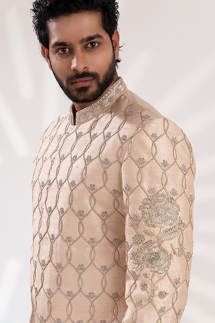 Light Gold Raw Silk Hand Embroidered Groom Sherwani Set by TIRA BY NARESH RAJ at Pernia's Pop Up Shop