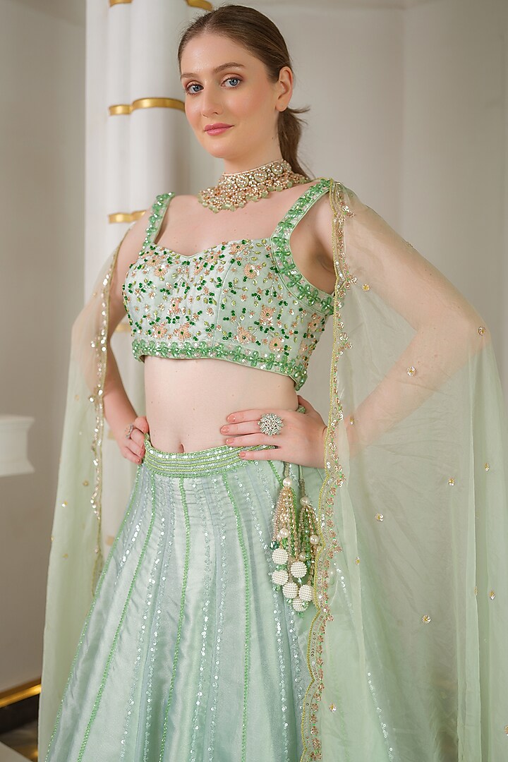 Sage Green Heavy Satin & Organza Hand Embroidered Wedding Lehenga Set by Tamaraa By Tahani at Pernia's Pop Up Shop