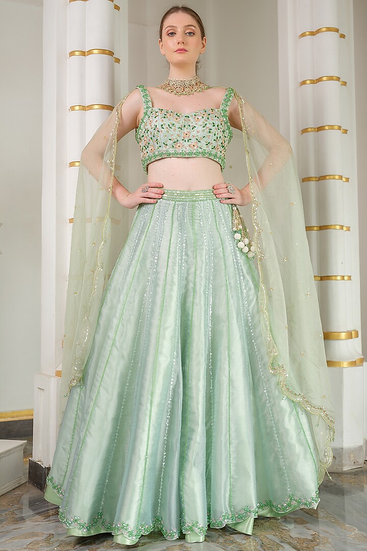 Sage Green Heavy Satin & Organza Hand Embroidered Wedding Lehenga Set by Tamaraa By Tahani at Pernia's Pop Up Shop
