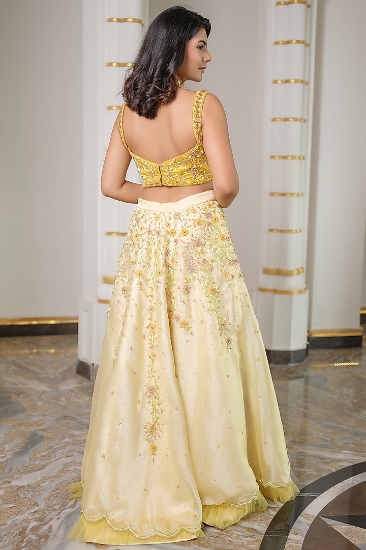 Yellow Heavy Satin & Organza Hand Embroidered Wedding Lehenga Set by Tamaraa By Tahani at Pernia's Pop Up Shop
