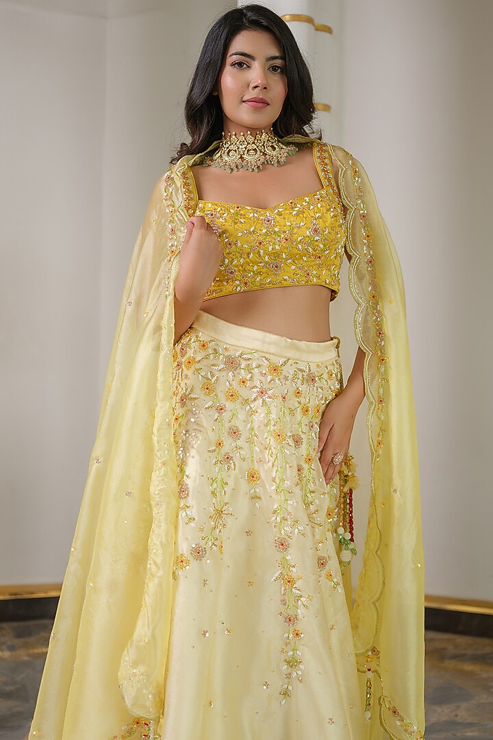 Yellow Heavy Satin & Organza Hand Embroidered Wedding Lehenga Set by Tamaraa By Tahani at Pernia's Pop Up Shop