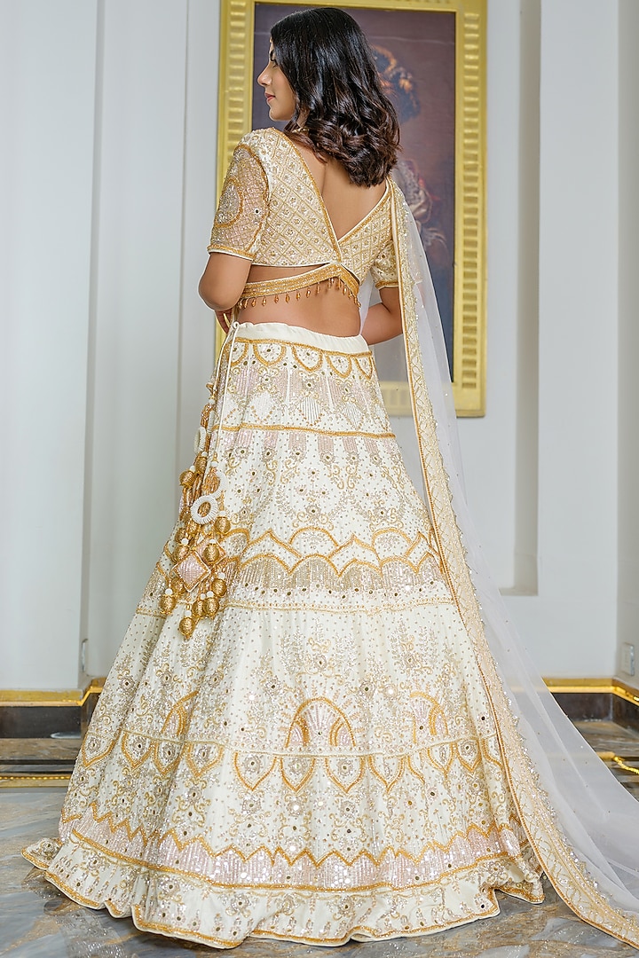 Gold Silk Crystal Embroidered Bridal Lehenga Set by Tamaraa By Tahani at Pernia's Pop Up Shop