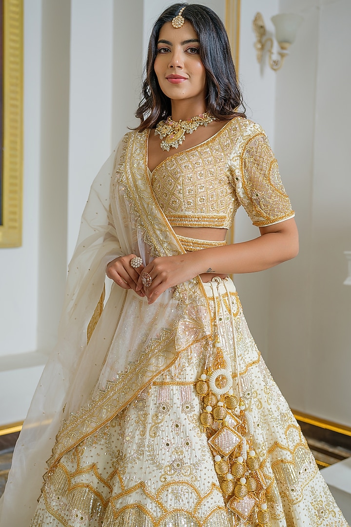 Gold Silk Crystal Embroidered Bridal Lehenga Set by Tamaraa By Tahani at Pernia's Pop Up Shop