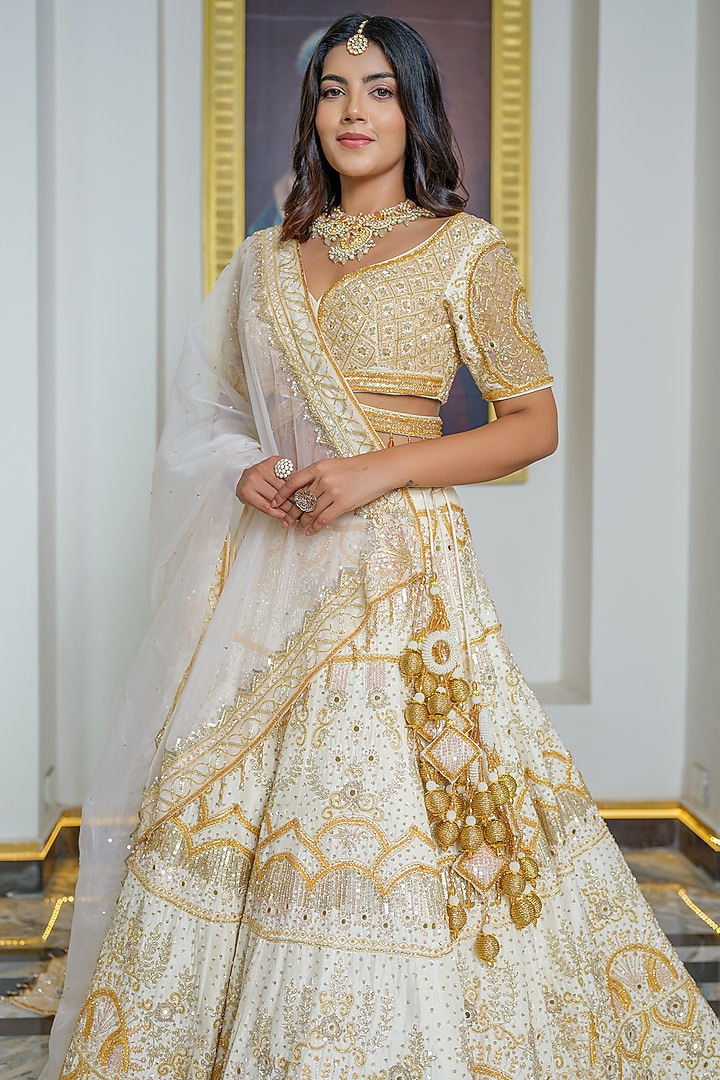 Gold Silk Crystal Embroidered Bridal Lehenga Set by Tamaraa By Tahani at Pernia's Pop Up Shop