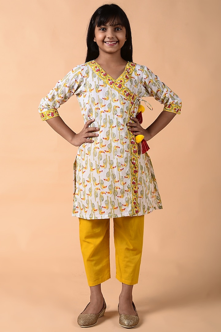 Off-White & Yellow Printed Angrakha Kurta Set For Girls by THE COTTON STAPLE