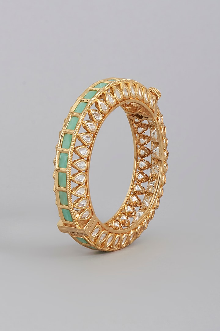 Gold Finish Bangle In Brass by Tad Accessories at Pernia's Pop Up Shop