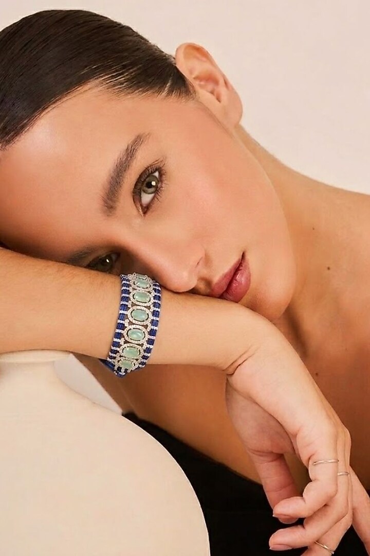 White Rhodium Finish Cubic Zirconia Bracelet by Tad Accessories at Pernia's Pop Up Shop