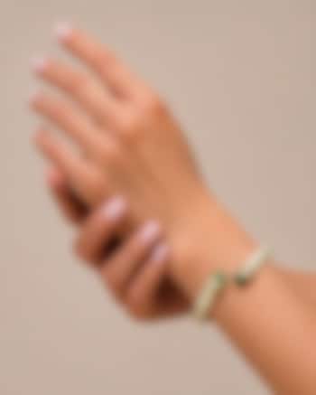 Gold Finish Green Stone Enameled Bangle by Tad Accessories at Pernia's Pop Up Shop