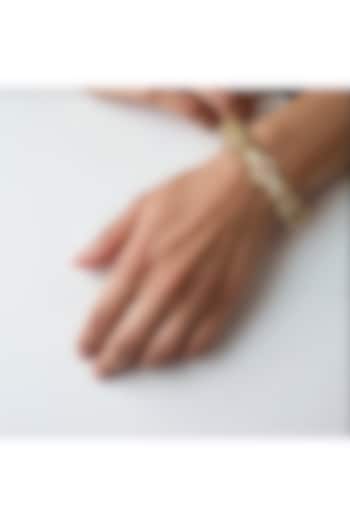 Gold Finish Kundan Polki & Ruby Temple Bangle by Tad Accessories at Pernia's Pop Up Shop