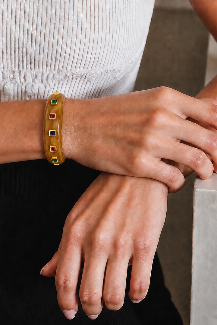 Gold Finish Cubic Zirconia Cuff by Tad Accessories at Pernia's Pop Up Shop