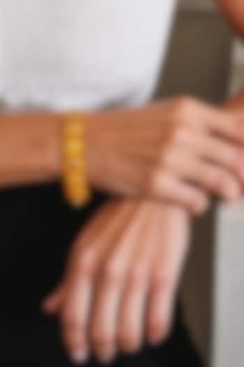 Gold Finish Cubic Zirconia & Yellow Stone Stretchable Bracelet by Tad Accessories at Pernia's Pop Up Shop