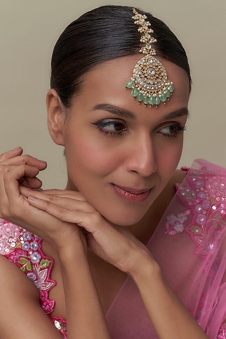Gold Finish Kundan Polki & Green Stone Maangtikka by Tad Accessories at Pernia's Pop Up Shop