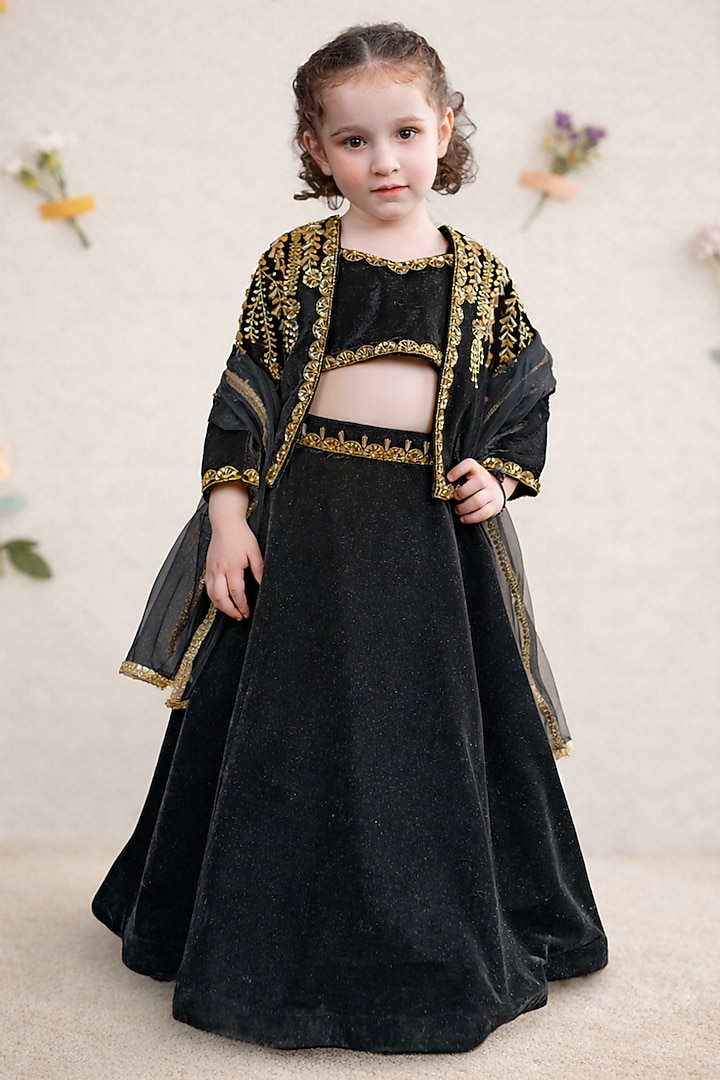 Black Velvet Embroidered Jacket Lehenga Set For Girls by Devykids at Pernia's Pop Up Shop