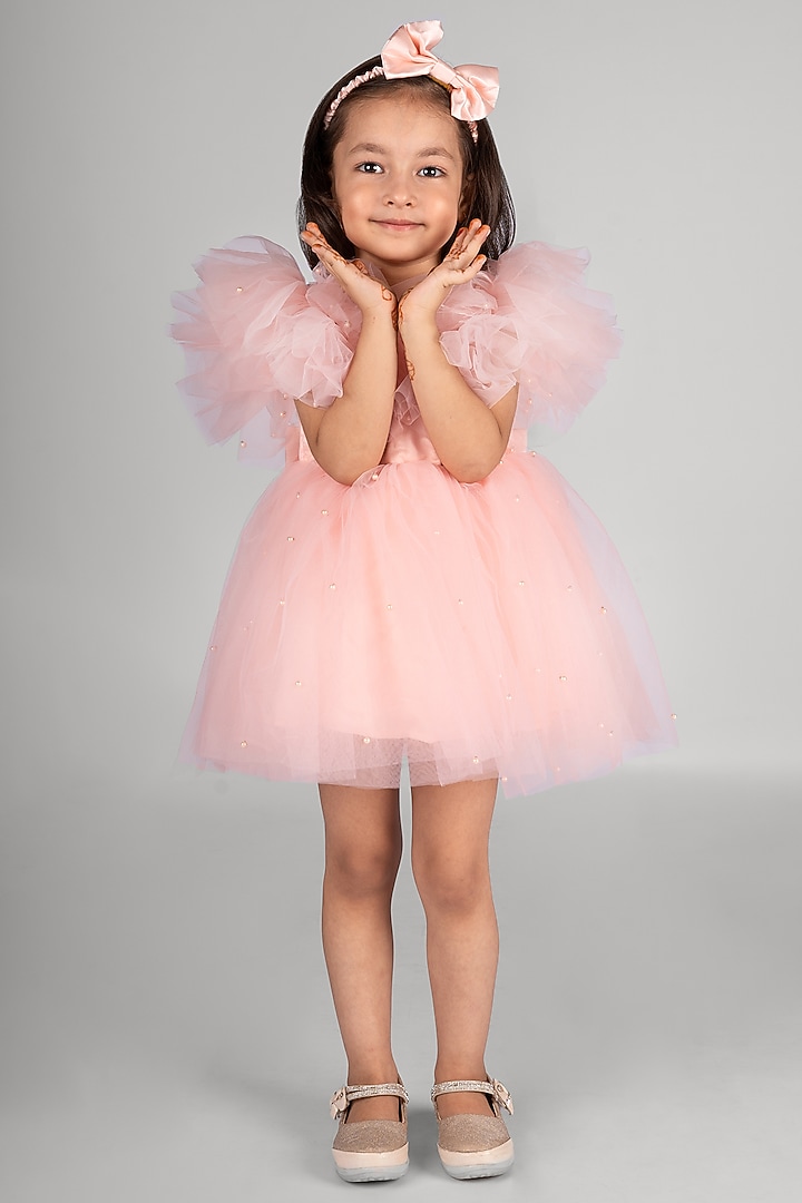 Baby Pink Net Pearl Embellished Dress For Girls by Devykids at Pernia's Pop Up Shop