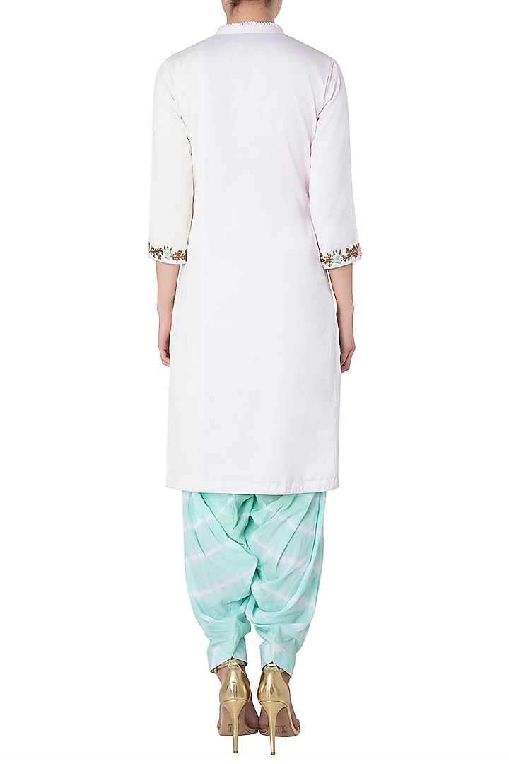 Baby pink and offwhite embroidered kurta with mint green shibori salwar available only at Pernia's Pop Up Shop.