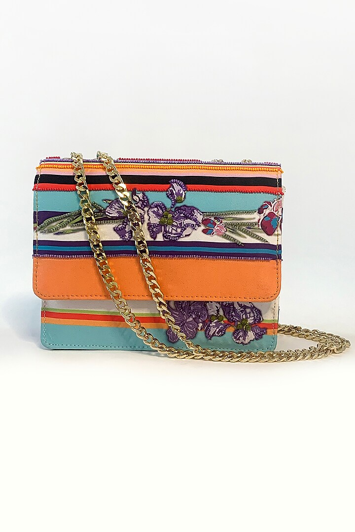 Multi-Colored Striped Sling Bag by The Garnish Company