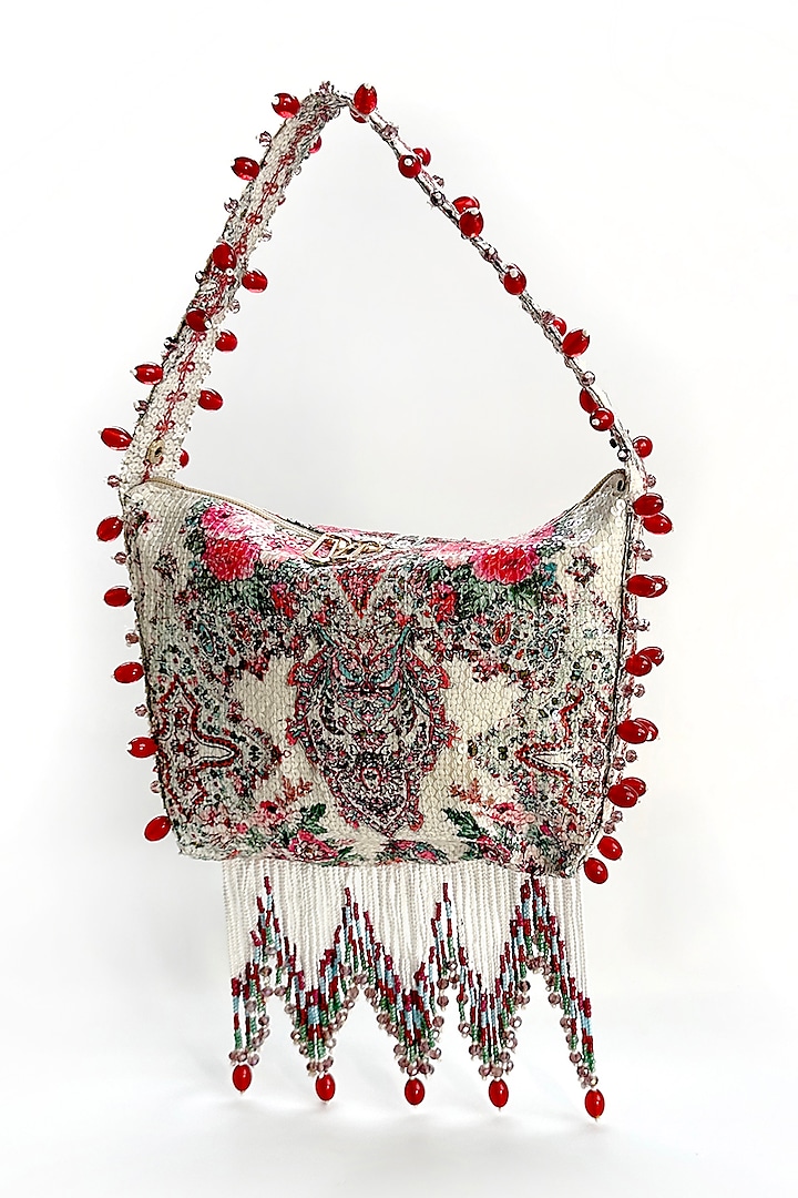 White & Pink Cotton Sequin & Tasseled Potli Bag by The Garnish Company at Pernia's Pop Up Shop