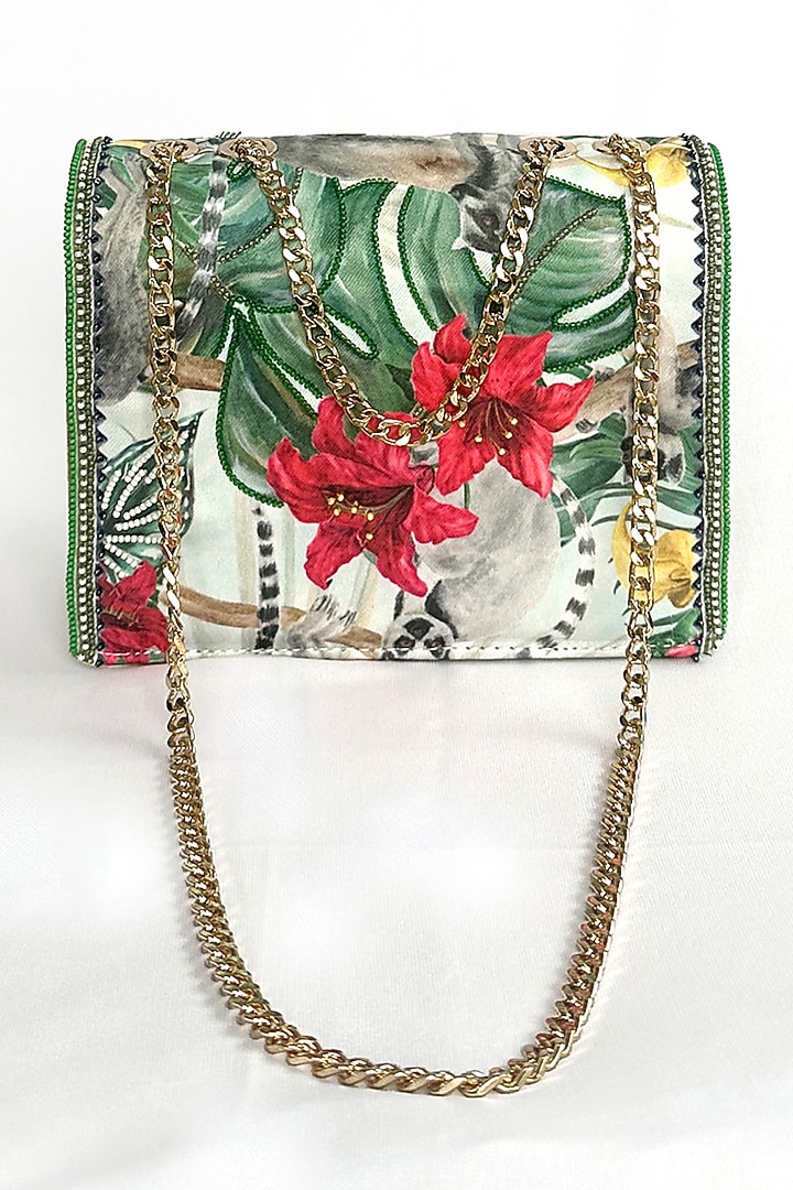 Green Satin Floral Printed Sling Bag by The Garnish Company at Pernia's Pop Up Shop
