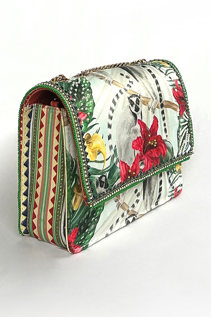 Green Satin Floral Printed Sling Bag by The Garnish Company at Pernia's Pop Up Shop