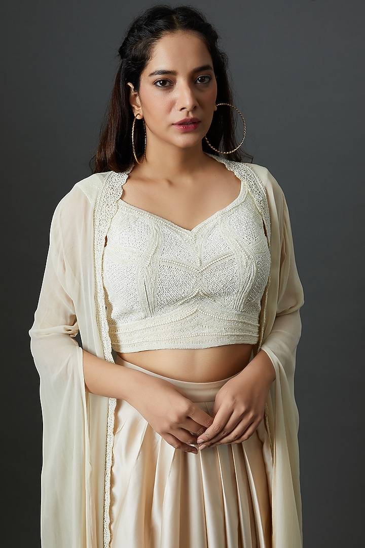 Ivory Satin Draped Skirt Set by 28 Threads at Pernia's Pop Up Shop