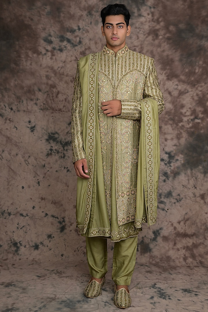 Green Raw Silk Embroidered Sherwani Set by THE BLUES
