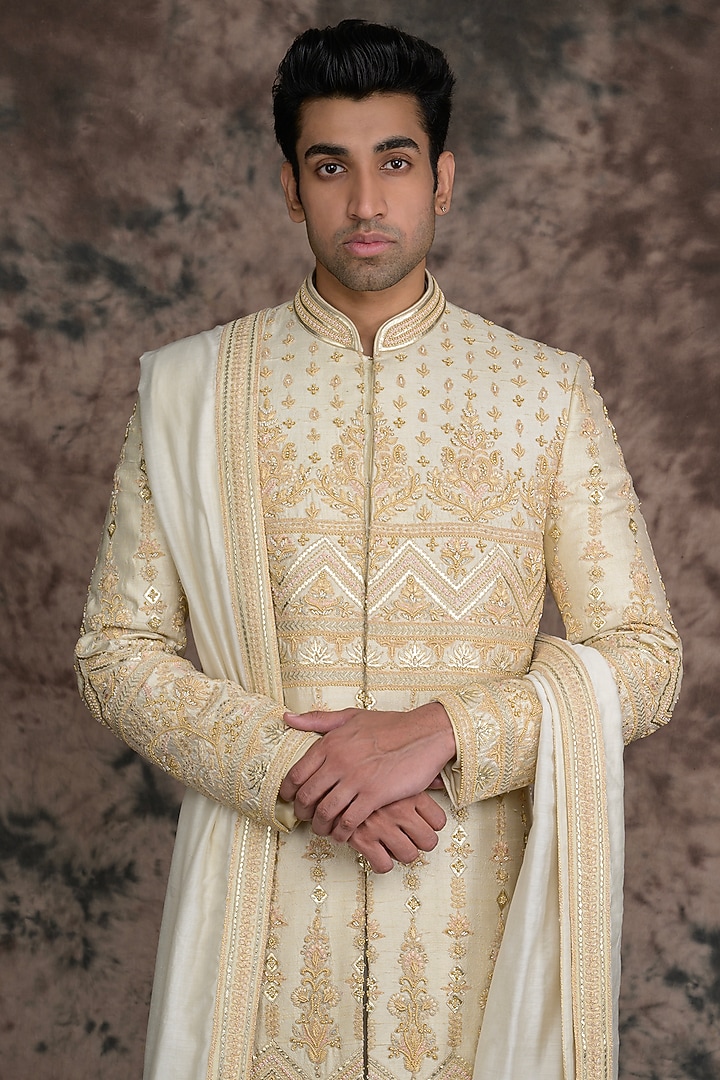 Ivory Raw Silk Embroidered Groom Sherwani Set by THE BLUES at Pernia's Pop Up Shop