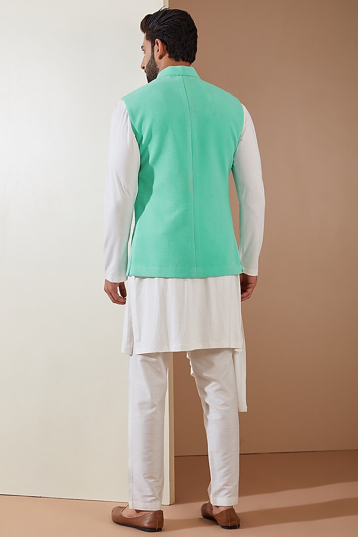 Green Hosiery Laser-Cut Applique Embellished Nehru Jacket Set by THE BLUES at Pernia's Pop Up Shop