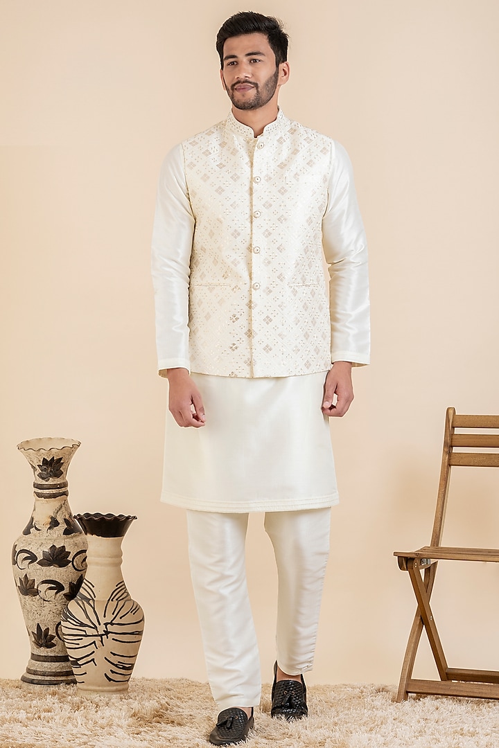 Cream Silk & Cotton Sequins Embroidered Bundi Jacket Set by The Ethnic Co