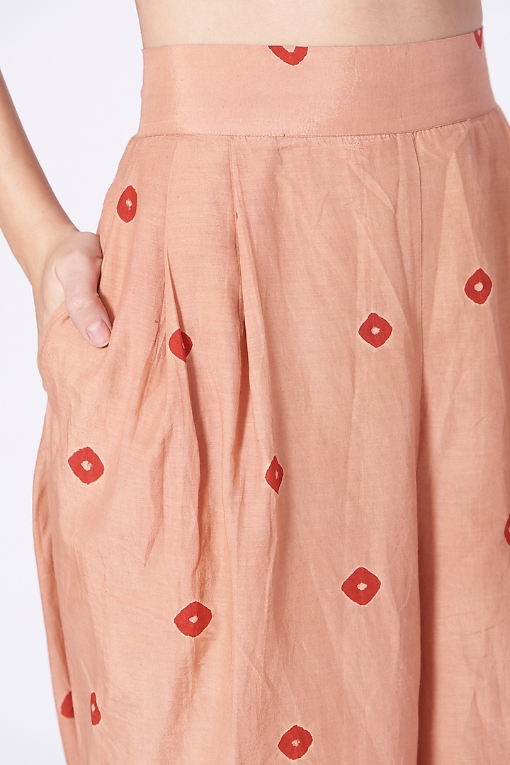 Peach Flared Pants by The Pot Plant at Pernia's Pop Up Shop