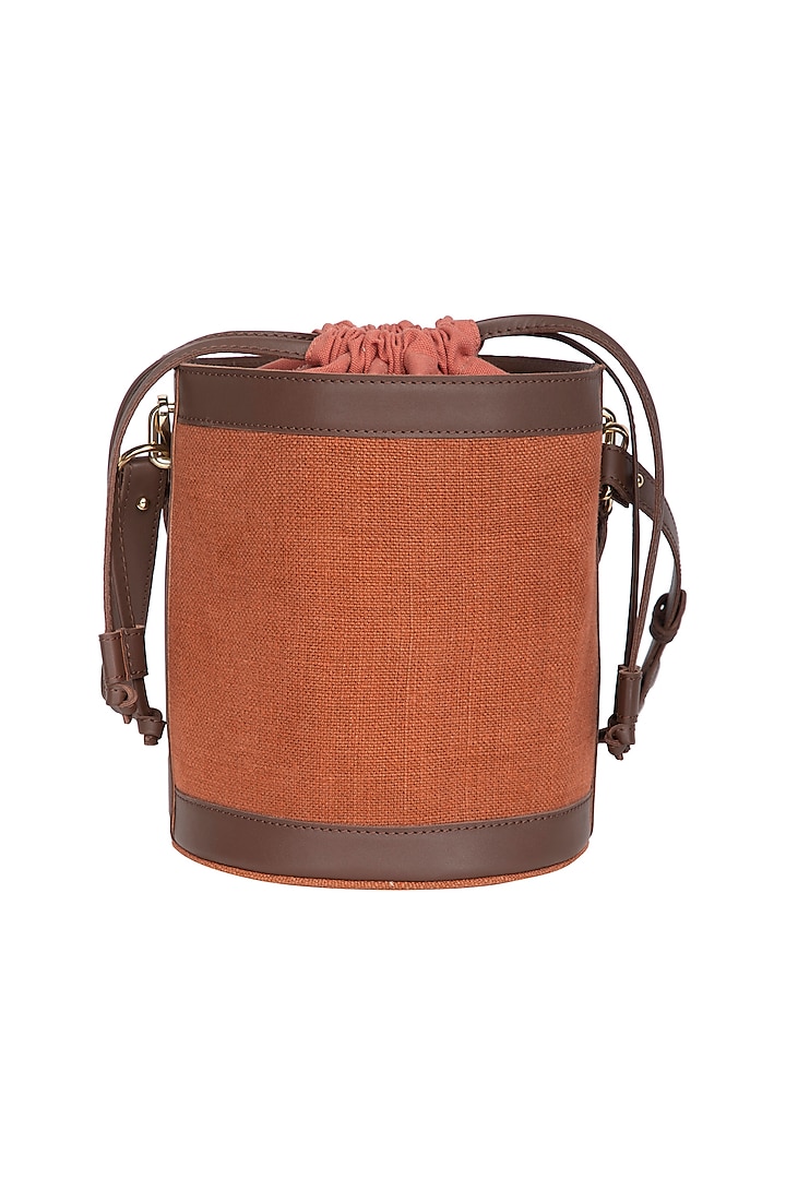 Rust Bucket Bag With Drawstring closure by The House of Ganges