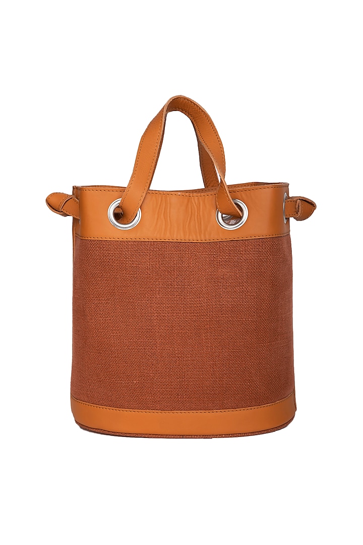 Rust Faux Leather Bucket Bag by The House of Ganges