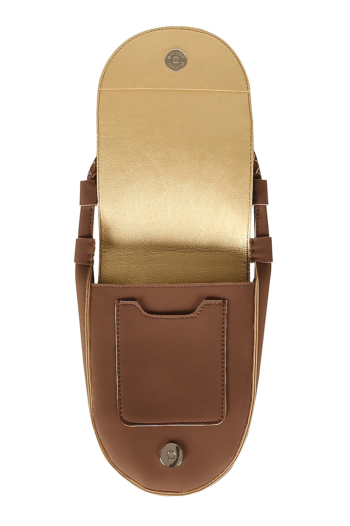 Rocky Road Brown Sling Bag With Button Closure by The House Of Ganges at Pernia's Pop Up Shop